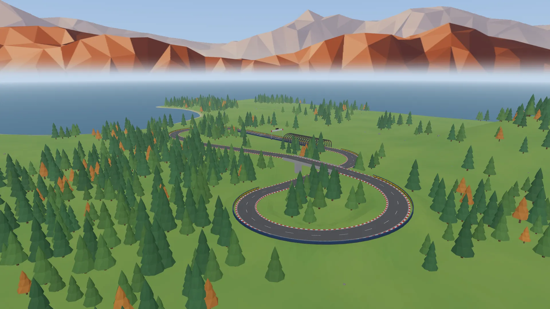 The circuit from the air: a figure of eight through pine woods, beside a lake, under red mountains